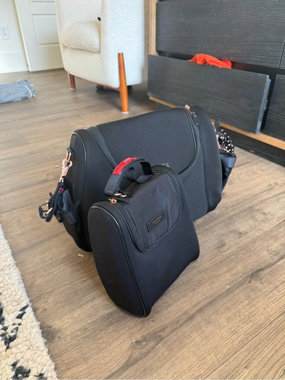 Storksak Black Baby Bag with Rose Gold Hardware